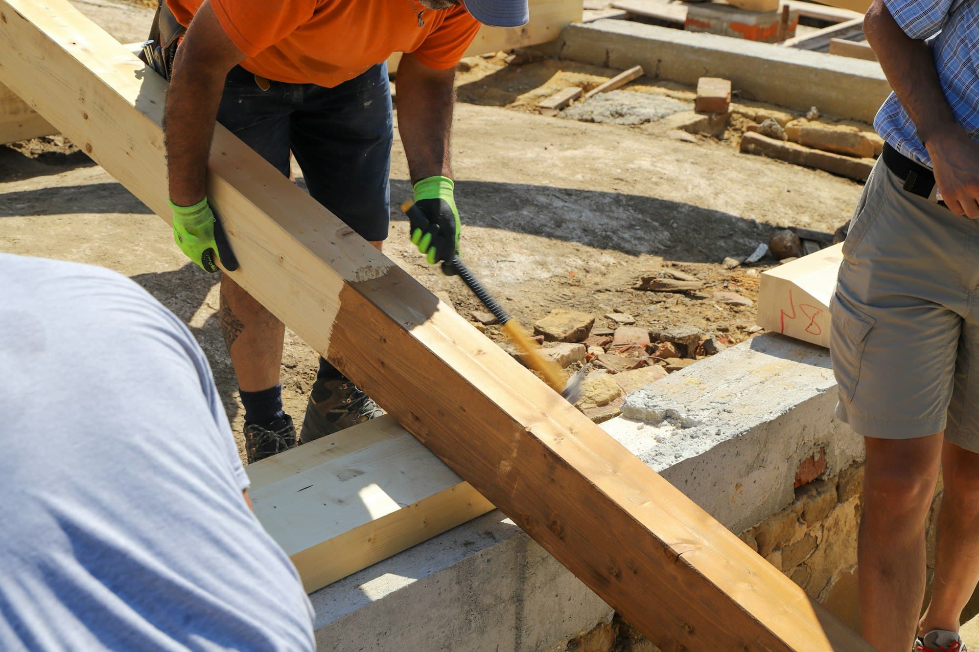 renovating a roof - construction site, workers at work